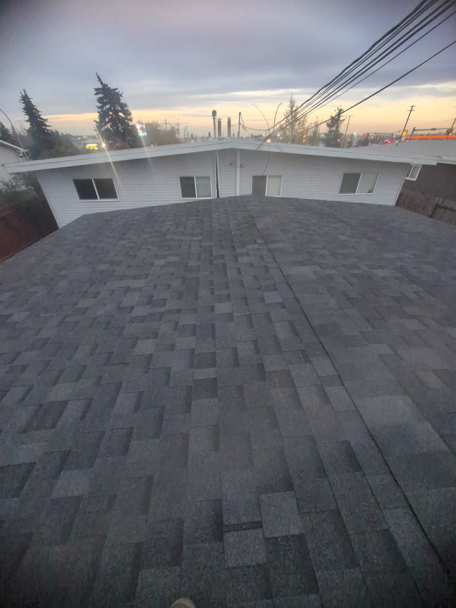 ACR Construction completed dark grey shingle roof bird's eye view