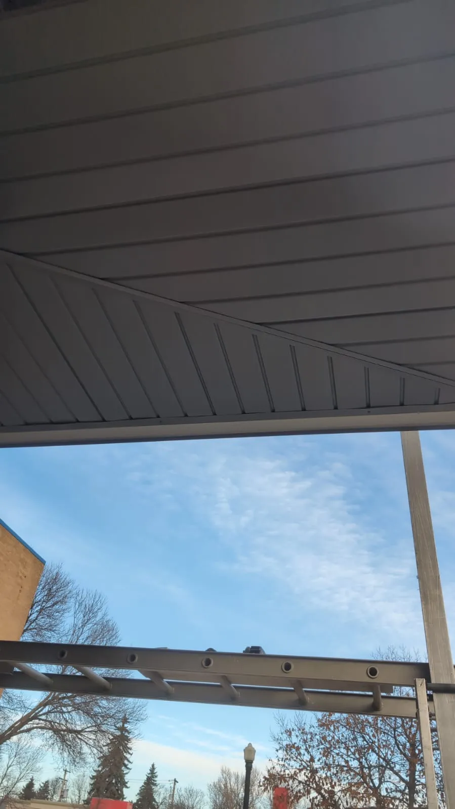 ACR Construction commercial soffit panel installation underside view