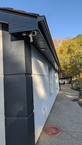 ACR Construction siding and downspout installation on residential home